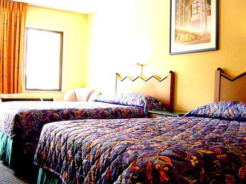 Shining Light Inn & Suites Kissimmee Habitación foto